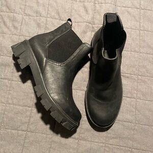 Woman’s boots. Never worn. Black.